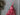 Red tassel on a gray grid background