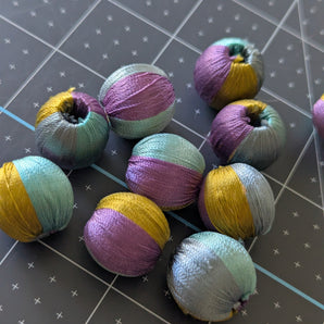 Small Set of Thread-Wrapped Beads